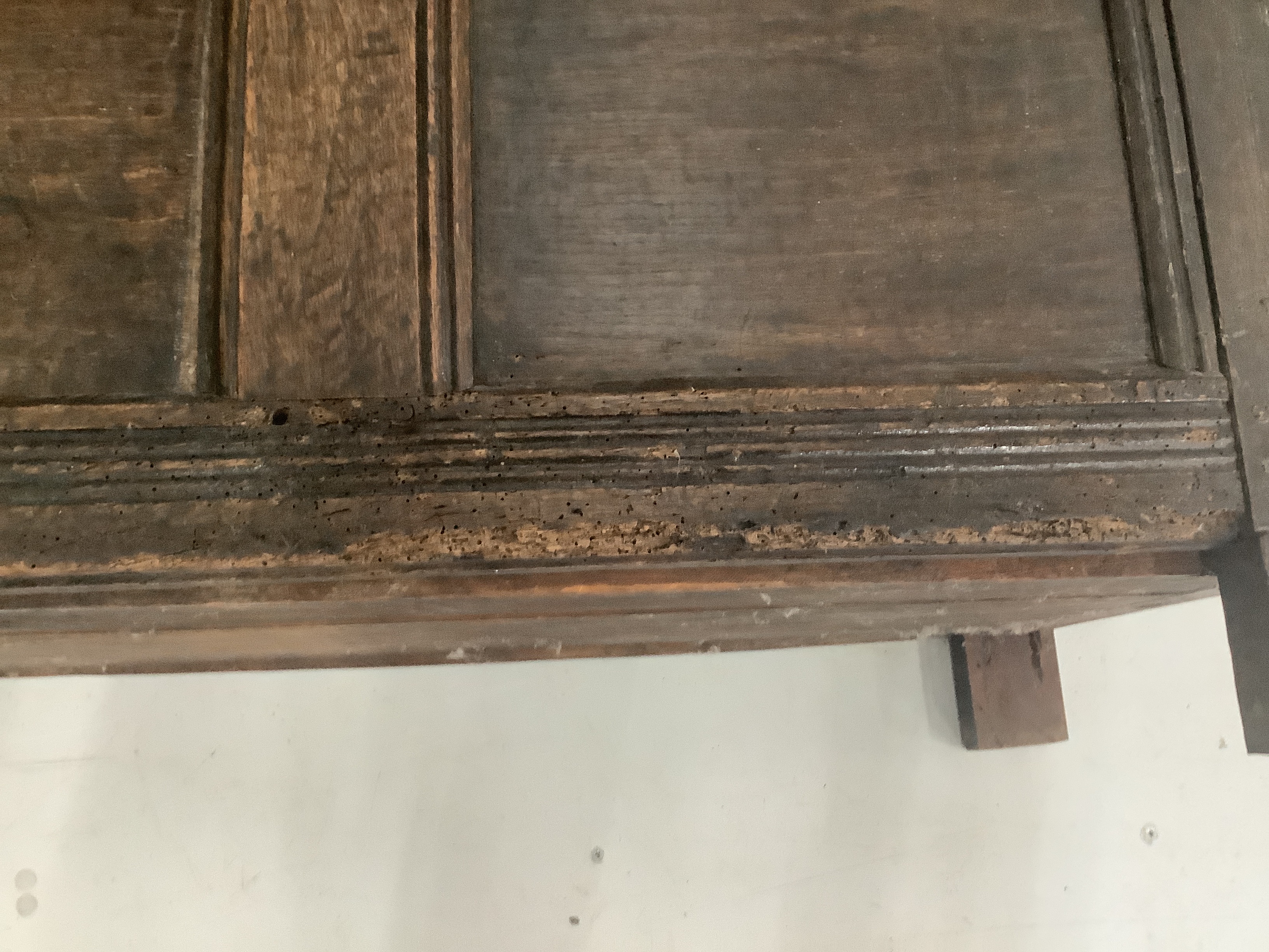 A small 17th century and later panelled oak coffer, width 99cm, depth 48cm, height 54cm